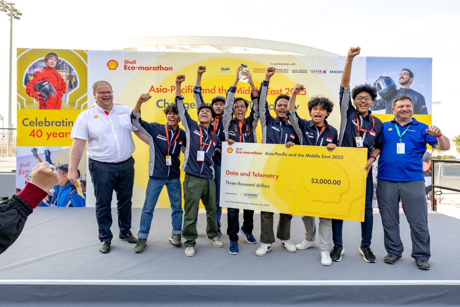 Batavia Gasoline Team, race number 11, from Universitas Negeri Jakarta, Indonesia, competing in the Internal Combustion Engine-Prototype category ,celebrate during the Awards Ceremony on day 5 of Shell Eco-marathon Asia-Pacific and Middle East 2025 at Lusail International Circuit, Wednesday, 12th February, 2025, Doha, Qatar, Peksi Cahyo.